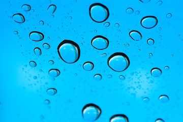 Water drops on light blue background