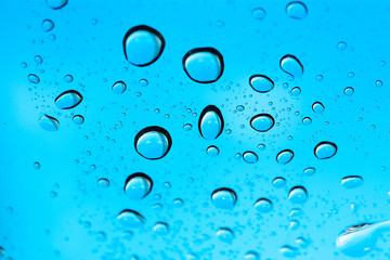 Water drops on light blue background