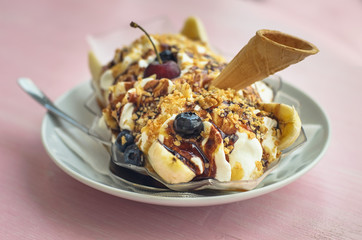 Dessert from ice cream, banana, waffle