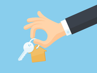 Hand holding house keys vector illustration in flat style