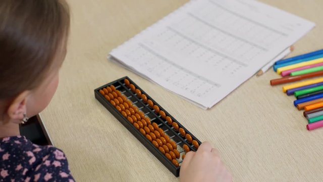 Girl performs arithmetic tasks on Japanese accounts