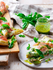 PEA PROSCIUTTO SPRING PIZZA . Top view. selective focus