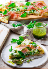 PEA PROSCIUTTO SPRING PIZZA . Top view. selective focus
