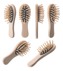 Wood hairbrush isolated on white background.