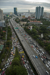 Aerial view panoramic of Expressway road in Bangkok city, traffic jam on rush hour period.