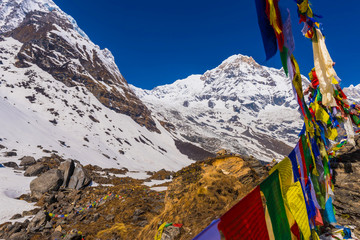 Prayer flags and Mt. Annapurna I background from Annapurna Base Camp ,Nepal.