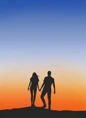 Fototapeta premium Male and female couples Walking hand in hand warm silhouette .