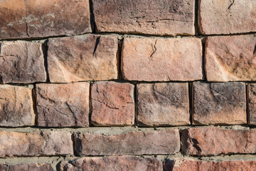 Obraz premium Abstract background texture of an old light brown stones in the wall