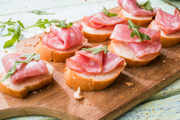Sandwiches with ham and greens
