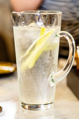 Lemonade cucumber sweaty glass decanter.
