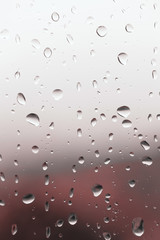 Dirty window of drops in a rainy day