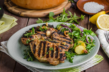 Grilled pork chops with lettuce salad