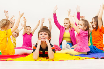 Birthday boy dreaming and laying on the floor