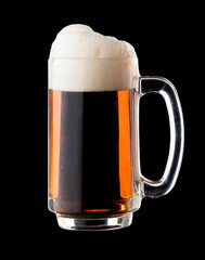 glass of dark beer on black background