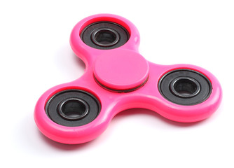 Pink fidget finger spinner toy isolated on white background