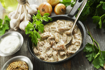 Stewed pork with  mustard sauce