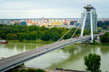 Novo most, New bridge of Bratislava with colorfull cityscape in the background