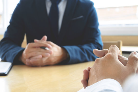 Job interview with human resource manager in office, selective focus