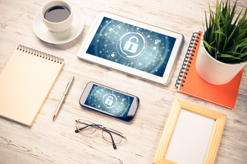 Web security and technology concept with tablet pc on wooden tab