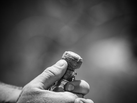 Close up of a champagne cork about to pop