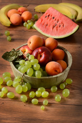 Assorted fruit on wooden table