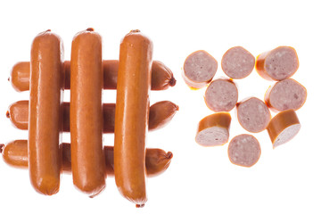 Small smoked sausages on white background.