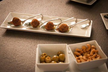appetizer on spoon on plate