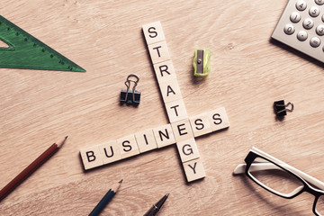 Conceptual business keywords on table with elements of game maki