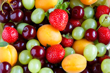 Mixed Fresh fruits Background. Selective focus and copy space.