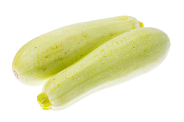Young zucchini on white background. 