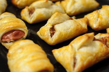 puffs with apple jam on backing tray
