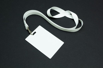 Blank tag id on a black background. Empty id card mock up.