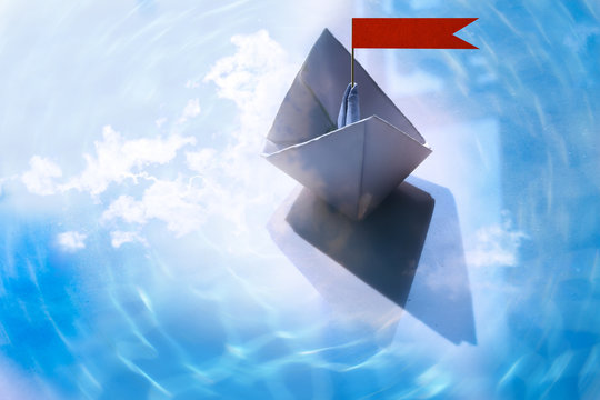 Abstract  paper boat sailing on water with waves and ripples. can used image concept.