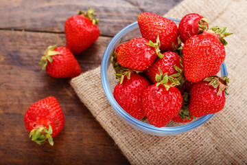 Ripe strawberry on burlap