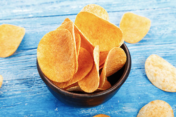potato chips in a clay plate