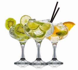 alcohol cocktail set on a white with fresh summer fruits