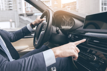 Naklejka premium Young business man test drive new car