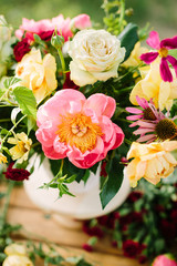 nature, floral design, arts and crafts, wedding, summer concept - clean colored bouquet with tender english roses and delicate yellow avalanches, peonies coral charm and dianthuses
