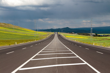 Fototapeta premium Highway. Open views and sunny weather to travel.