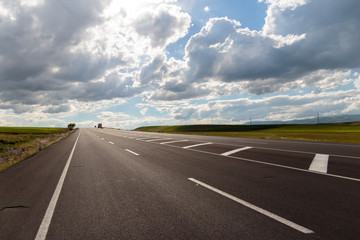 Fototapeta premium Highway. Open views and sunny weather to travel.