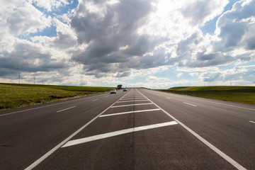 Highway. Open views and sunny weather to travel.