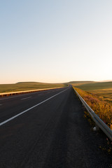 Highway. Open views and sunny weather to travel.