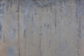Rough concrete wall texture with rust marks