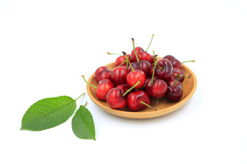 The big cherries are on a white background