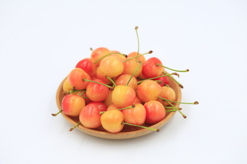 The big cherries are on a white background