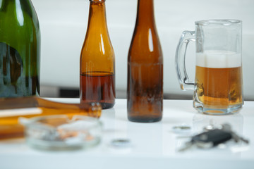 mug of beer and bottles in a bar