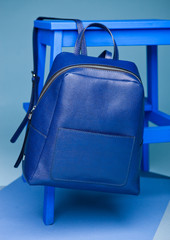 Blue color fashion style still life setup on blue