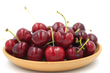 The big cherries are on a white background