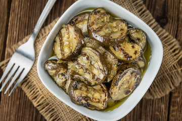 Zucchinis (grilled) on wooden background (selective focus)
