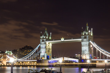 The Tower bridge in London illuminated at night